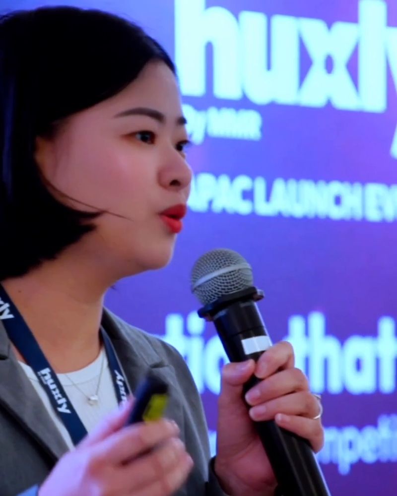 A presenter speaks at a product launch at The Fullerton Hotel