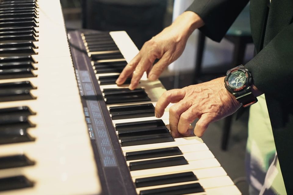 Hands on a keyboard during the live band set
