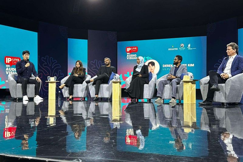 The IP Live Chat on film and tourism in Malé, the panel on a studio set with an LED wall