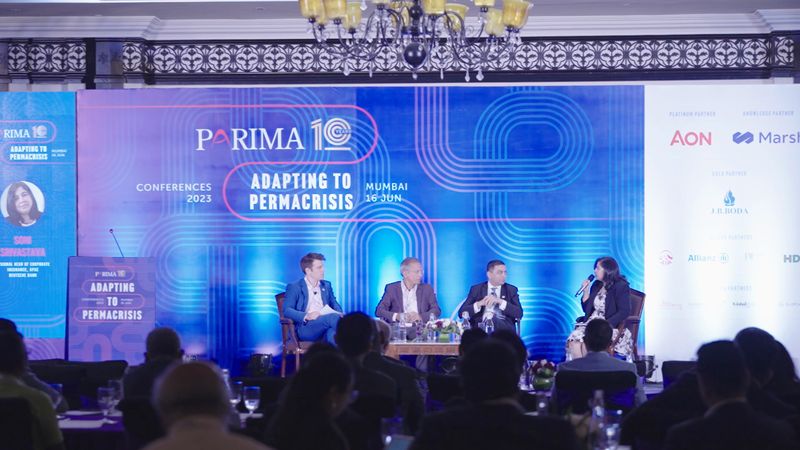 A panel discussion on stage at the PARIMA conference in Mumbai